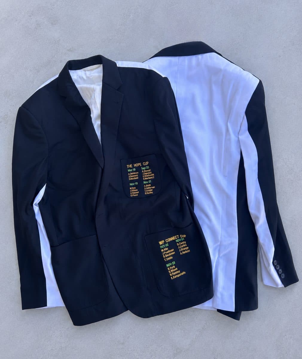The winners' blazers, embroidered with the names of past champions